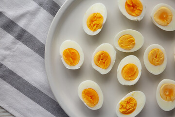 Cooked Hard Boiled Eggs on a Plate, top view.