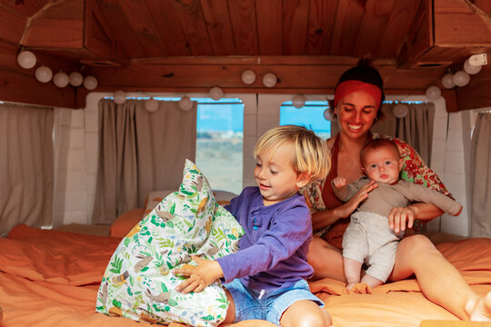 Family enjoying their van life with handmade amenities
