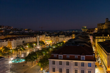 View of king pedro IV square called rossio at night in Lisbon Portugal 