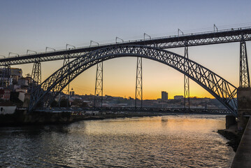 Sunset view with Dom Luis I Bridge between Porto and Vila Nova de Gaia, Portugal