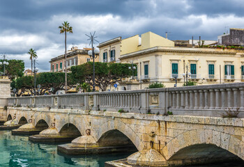 Fototapeta na wymiar Umbertino Bridge in Syracuse historic city, Sicily Island, Italy