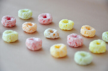 Sweet Fruit Loops Cereal on Background with Copy Space