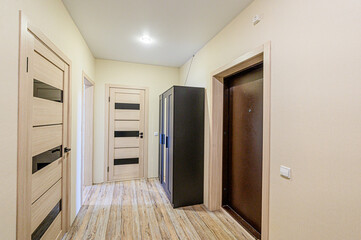 standard room interior apartment. room doors, renovation corridor lobby entrance hall