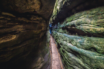 Passage in Bledne Skaly rock maze - tourist route in Table Mountains, Poland - obrazy, fototapety, plakaty