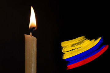mourning candle burning front of flag Colombia, memory of heroes served country, grief over loss,...