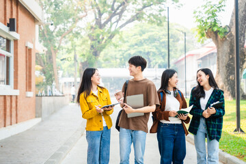 Obraz premium Diverse group of young adults from Asia and beyond, enjoying university life together. happy, learning, and making lifelong friendships, whether in outside class, sunny summer days or cozy weekends