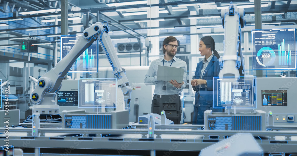 Fototapete Electronics Factory Assembly Line Digitalization: Automated Robot Arms Manufacturing Equipment. Managers Discussing Work while Futuristic AI Computer Vision Analyzing, Scanning Conveyor Line
