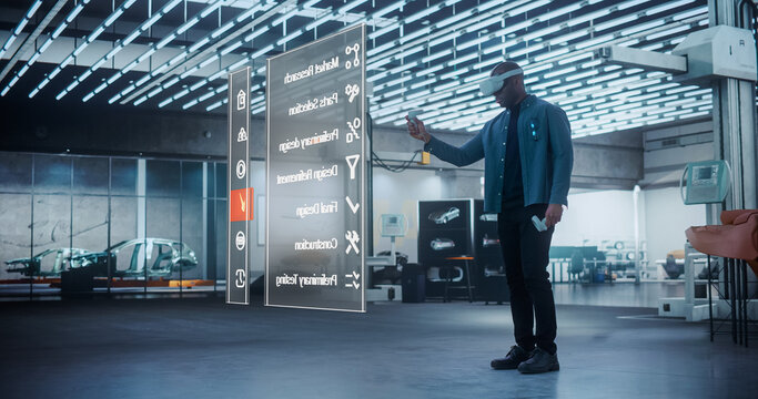 Futuristic Car Designer: Automotive Engineer Wearing Virtual Rality Headset Using Augmented Reality Hologram to Design 3D Model of High-Tech Electric Vehicle Optimizing Clean Energy Efficiency - Powered by Adobe