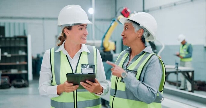 Engineering, women and tablet at building site for inspection, planning or teamwork. Construction, technology and senior architect with contractor for development, industrial renovation or discussion