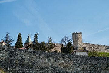 View of Kalemegdan fortress and Orthodox churches with crosses on top of the roof. The walls of the old medieval castle in the center of Belgrade are well preserved to our day.