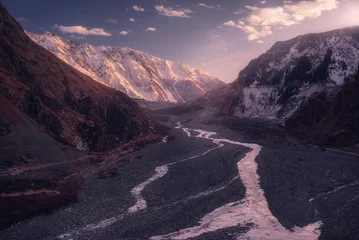 Fotobehang Last light. Beautiful winter View of the Caucasus mountain range in Georgia. Dariali valley © soso