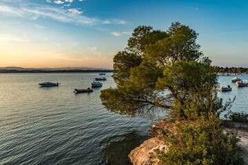 Shore beach view at summer, Vourvourou, Sithonia sleeve of Khalkidhiki peninsula, Greece. Popular scenery vacation destination