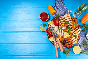 Summer vegan barbeque recipe. BBQ healthy balanced vegetarian food, grilled roasted tofu cheese steaks with vegetables