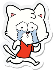 sticker of a crying cartoon cat