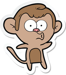 sticker of a cartoon surprised monkey
