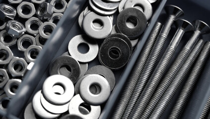 Detailed View Of Screw Organizer With Bolts, Nuts And Washers In Separated Cells 
