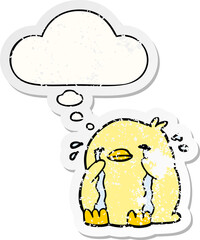 cartoon crying bird with thought bubble as a distressed worn sticker