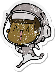 distressed sticker of a happy cartoon astronaut
