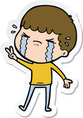 sticker of a cartoon man crying