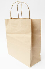 Brown Paper Shopping Bag on White. Recycled carton package for supermarket.