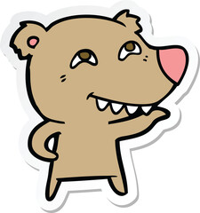 sticker of a cartoon bear showing teeth