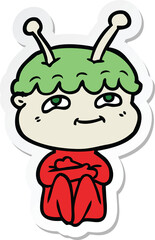 sticker of a friendly cartoon spaceman
