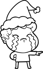 hand drawn line drawing of a man crying wearing santa hat