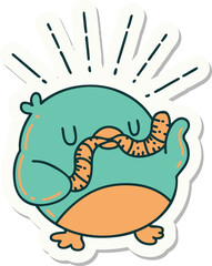sticker of a tattoo style robin with worm