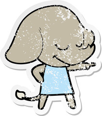 distressed sticker of a cartoon smiling elephant