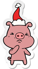 hand drawn sticker cartoon of a angry pig wearing santa hat