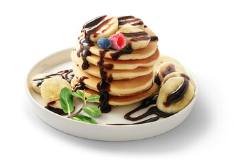 Plate with stack of pancakes with slices of banana, chocolate syrup isolated on white