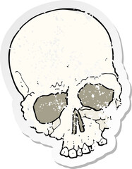 retro distressed sticker of a cartoon spooky old skull