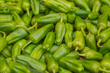 background with green Padrón peppers