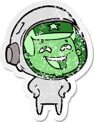 distressed sticker of a cartoon laughing astronaut