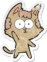 distressed sticker of a happy cartoon cat