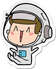 Obraz premium sticker of a happy cartoon astronaut sitting