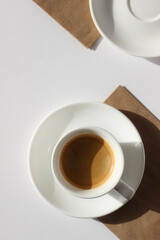 Drinking Coffee. Freshly Brewed Espresso Served on White Cafe Table. 