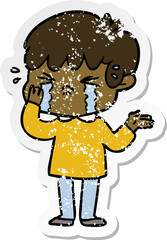 distressed sticker of a cartoon boy crying