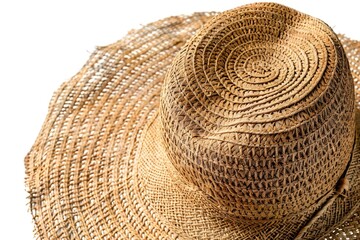Fototapeta na wymiar A close up of a straw hat on a table. Perfect for summer fashion concepts