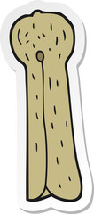 sticker of a cartoon old wooden peg