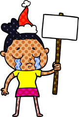 hand drawn comic book style illustration of a crying woman with protest sign wearing santa hat