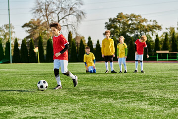 A group of young children, filled with joy and enthusiasm, are engaged in a spirited game of soccer. 