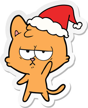 bored hand drawn sticker cartoon of a cat wearing santa hat