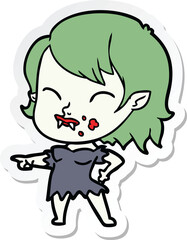 sticker of a cartoon vampire girl with blood on cheek