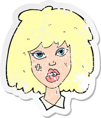 retro distressed sticker of a cartoon woman with bruised face