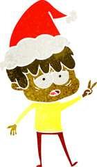 hand drawn retro cartoon of a exhausted boy wearing santa hat