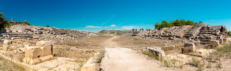 Picturesque ruins of the stadium in the ancient city of Perge. Ruins of the city of Perge in Turkey.