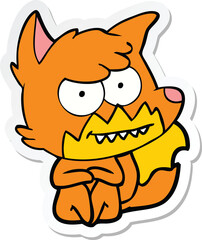 sticker of a cartoon grinning fox sitting