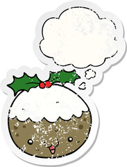 cute cartoon christmas pudding with thought bubble as a distressed worn sticker