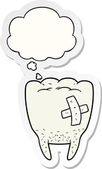 cartoon bad tooth with thought bubble as a printed sticker